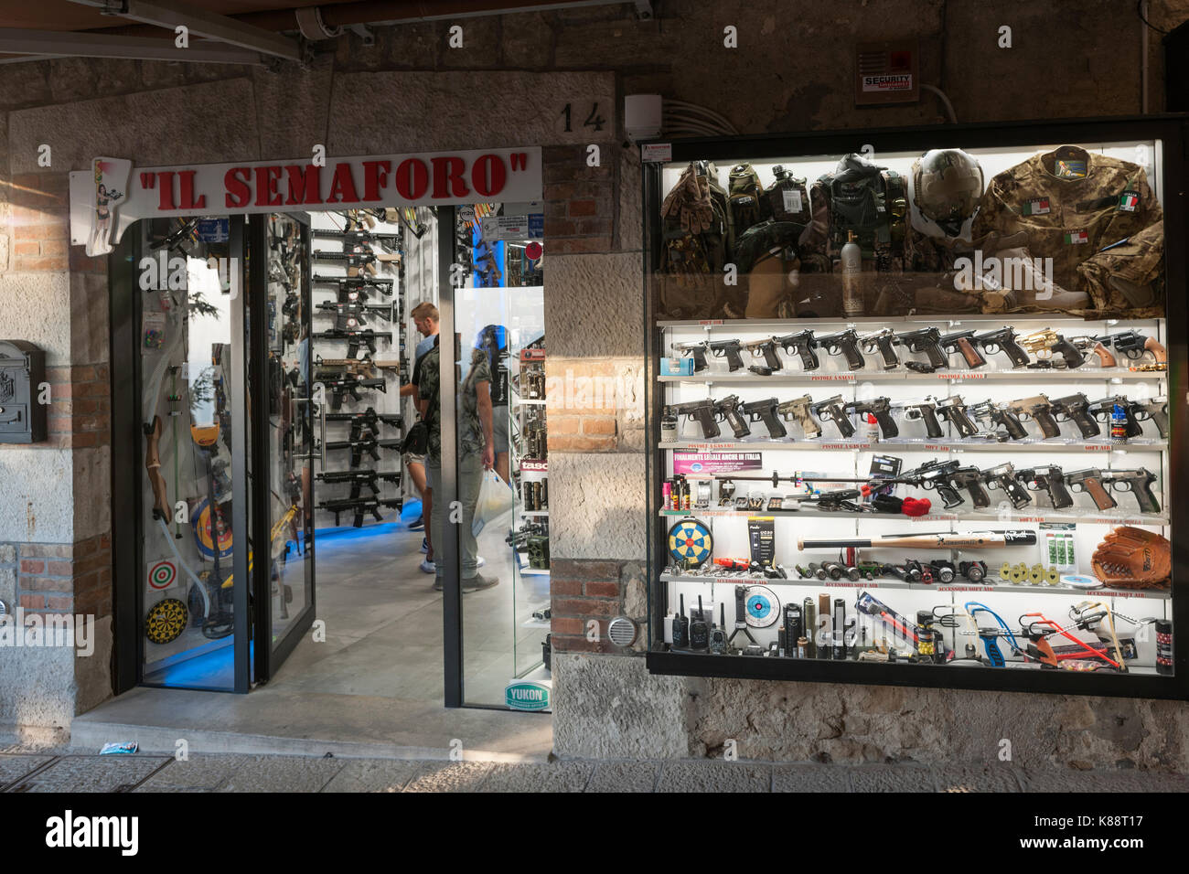 One of numerous shops specialising in air guns and replica weapons in the old town in San Marino. Stock Photo