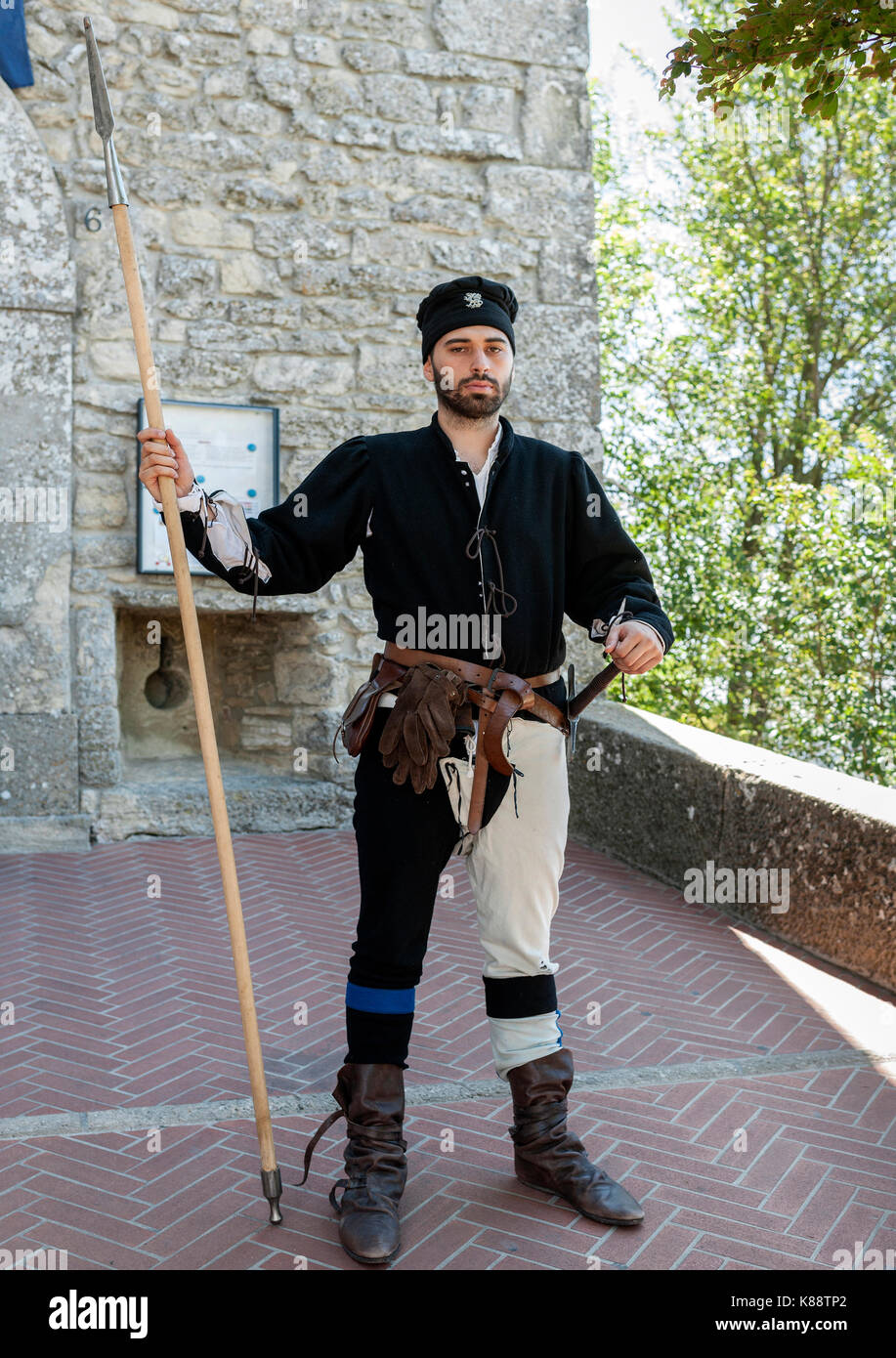 San Marini man dressed in a period costume for the annual Medieval Days Festival held in the old town of San Marino in the republic of San Marino. Stock Photo