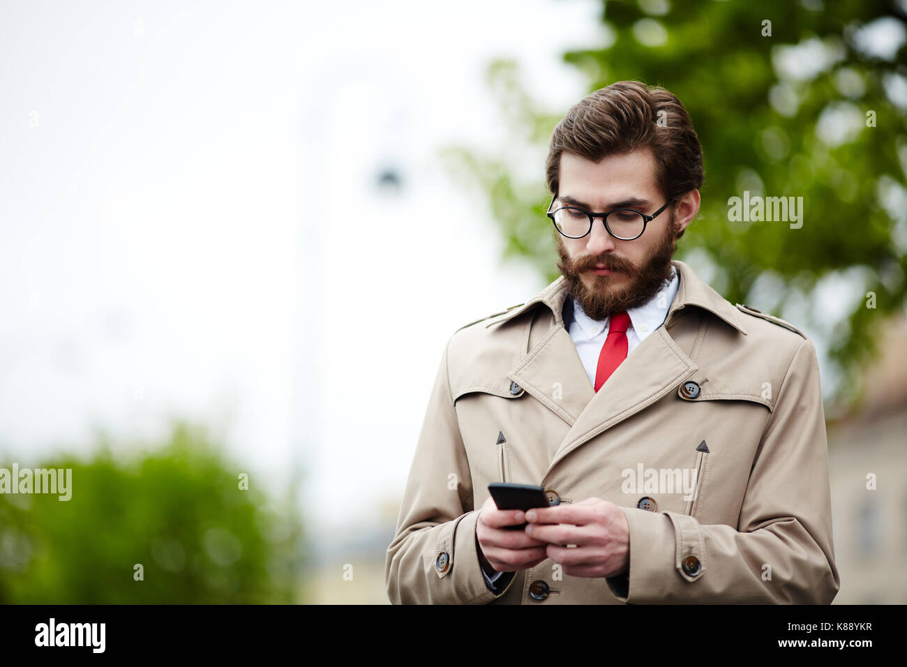 Beige trench coat hi-res stock photography and images - Alamy
