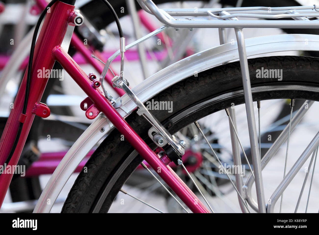 Bicycle detail in pink. Spain. Stock Photo