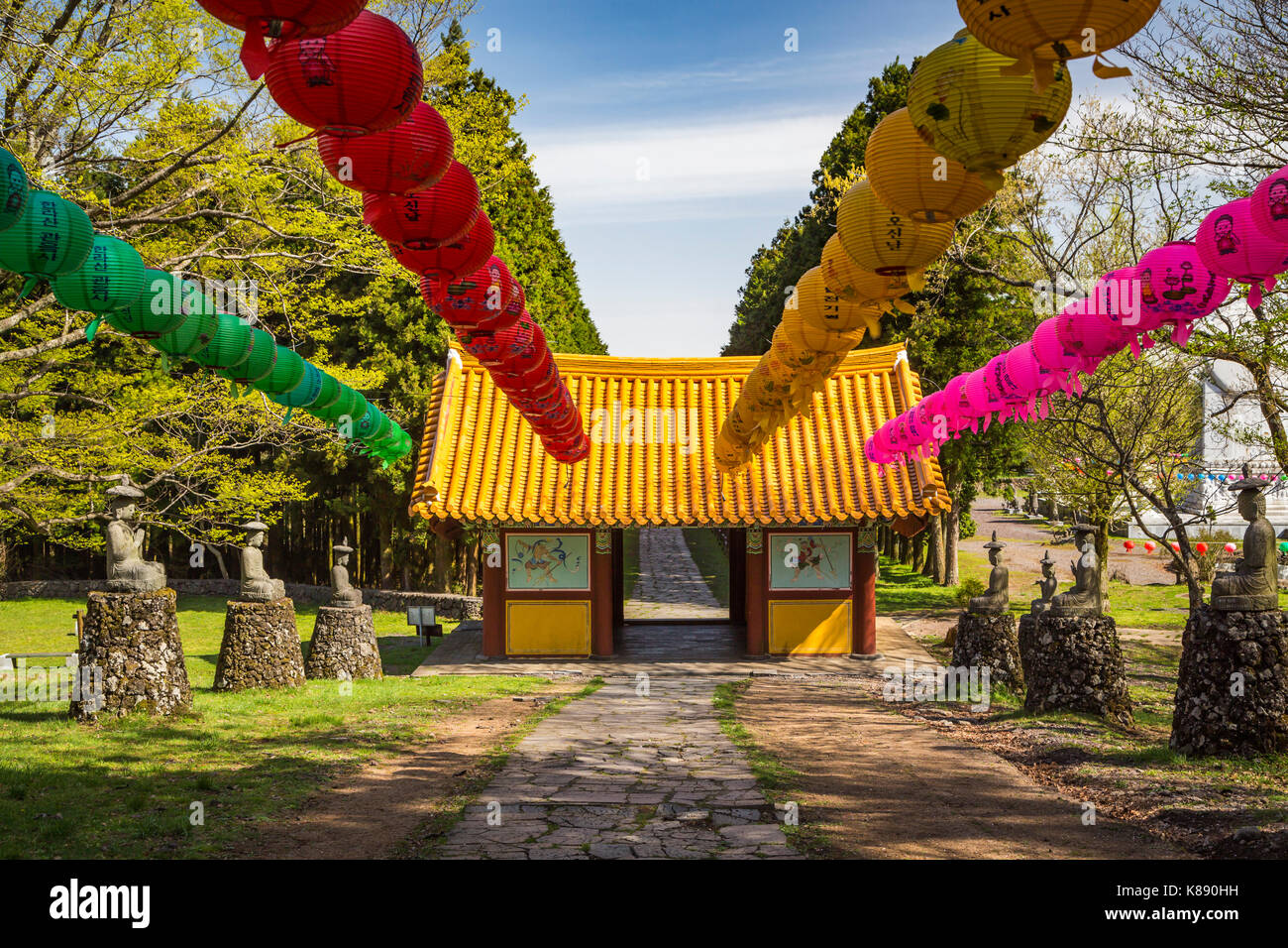 The entrance to the Gwaneumsa Temple with colorful lanerns at the foot of Mt. Halla in Ara-dong in Jeju City, Jeju Island, South Korea, Asia. Stock Photo