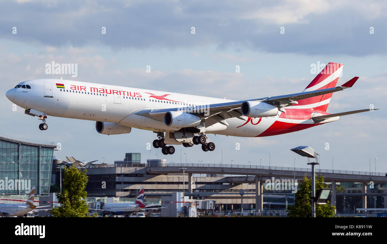An Airbus A340 widebody airliner of Air Mauritius approaching London Heathrow Airport's runway 09L. Stock Photo