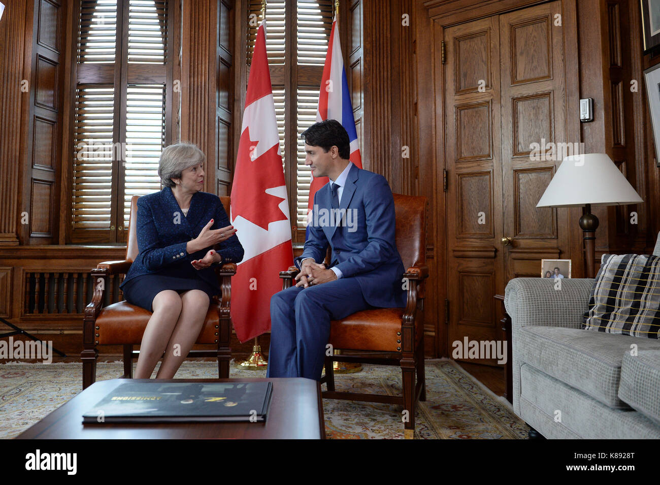 Prime Minister Theresa May talking with Canadian Prime Minister Justin Trudeau in Ottowa. Stock Photo
