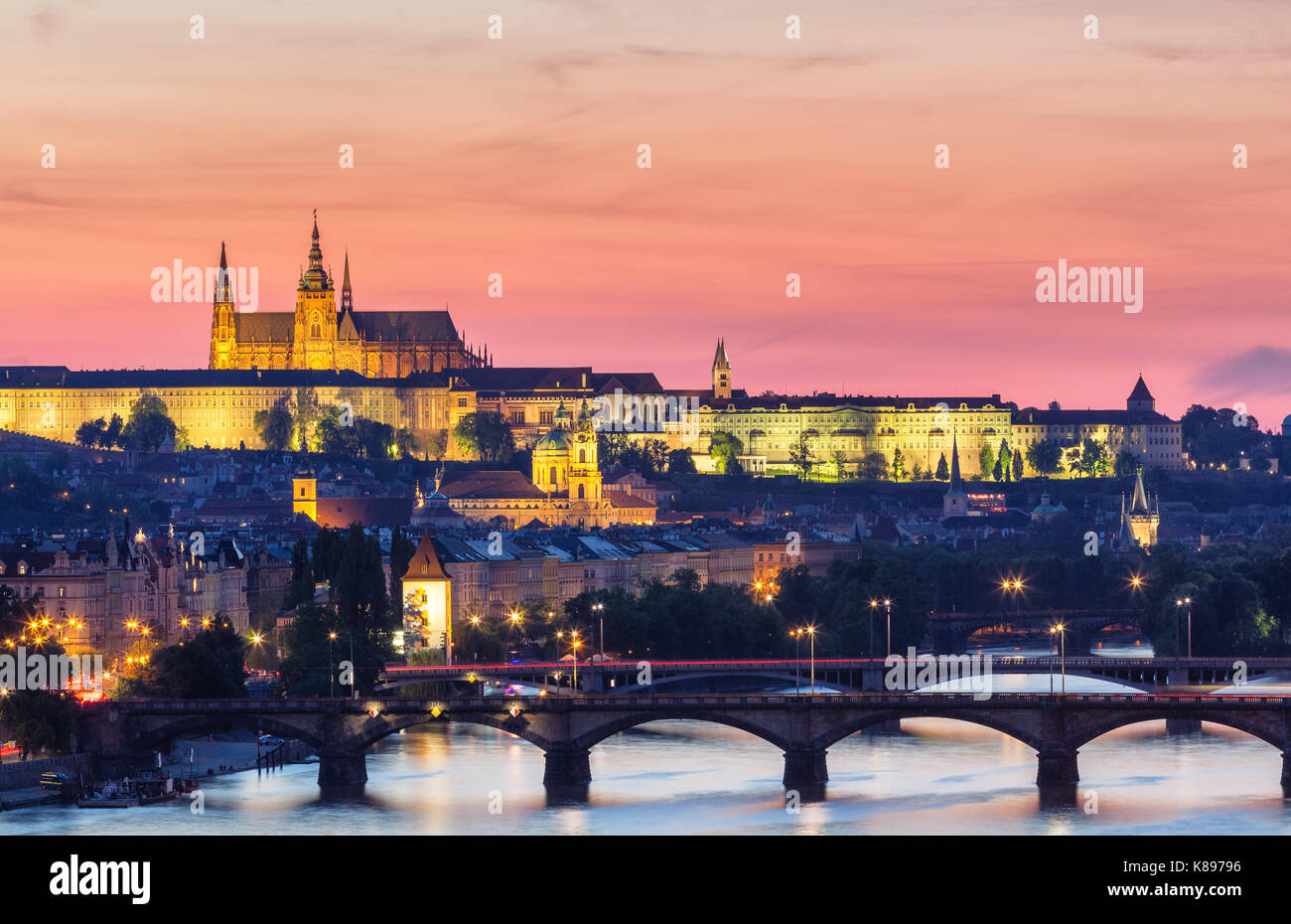Panorama of Prague with red roofs from above summer day at dusk, Czech Republic Stock Photo