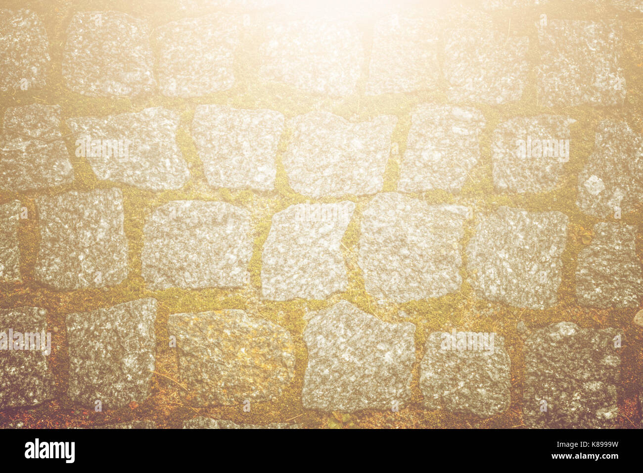Abstract background of old cobblestone pavement texture with natural ...