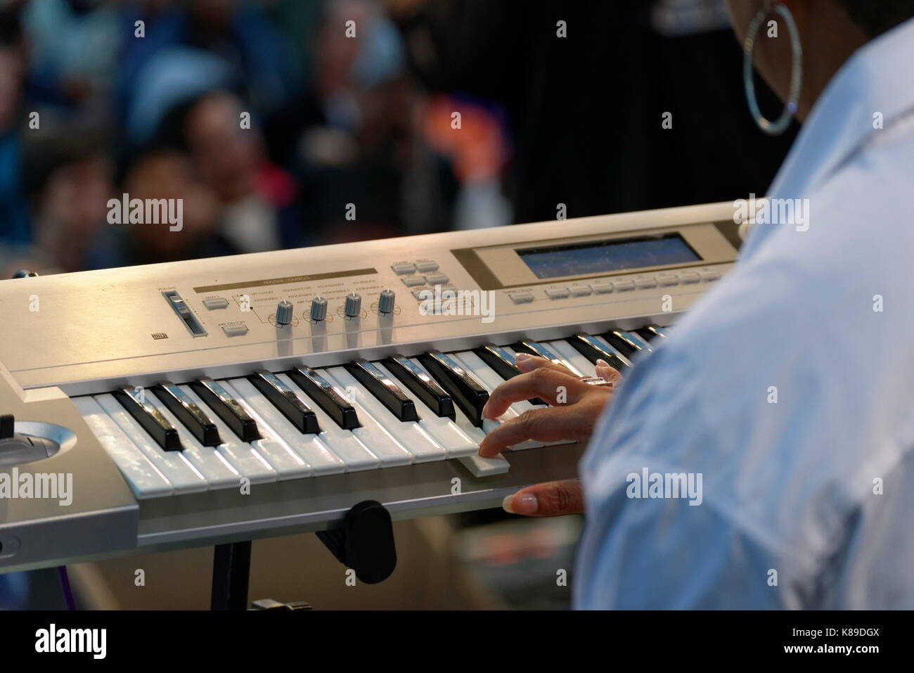 Funk band keyboard female performer crowd hires stock photography and