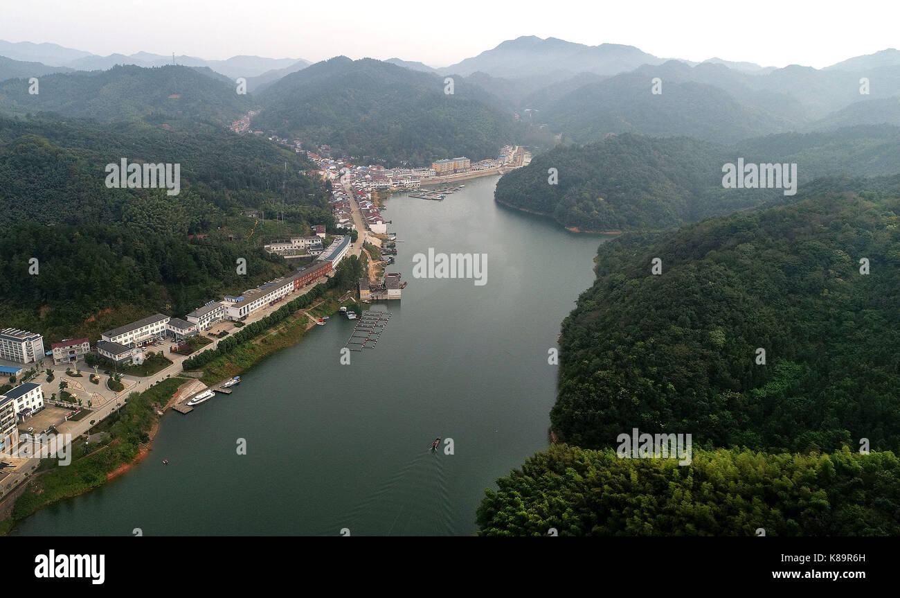 Lu'an. 18th Sep, 2017. Aerial photo taken on Sept. 18, 2017 shows the newly built Mabu Town near the Xianghongdian reservoir at Jinzhai County of Lu'an City, east China's Anhui Province. The Xianghongdian reservoir was approved as the National Water Park in 2004. Credit: Tao Ming/Xinhua/Alamy Live News Stock Photo