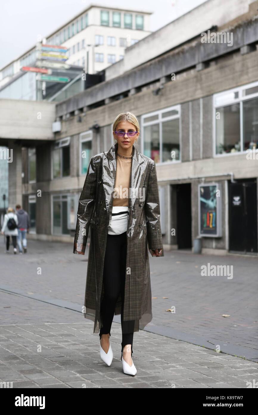 Blogger Caroline Daur posing outside of the Roland Mouret runway show