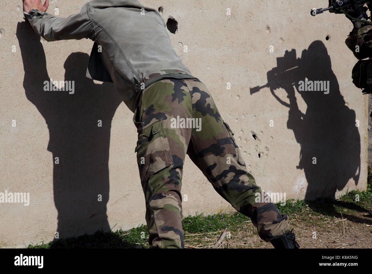 Legionnaires from the 2REP (2nd Foreign Paratroop Regiment) train during an urban combat exercise in Fraseli, Corsica on March 24, 2010. Stock Photo