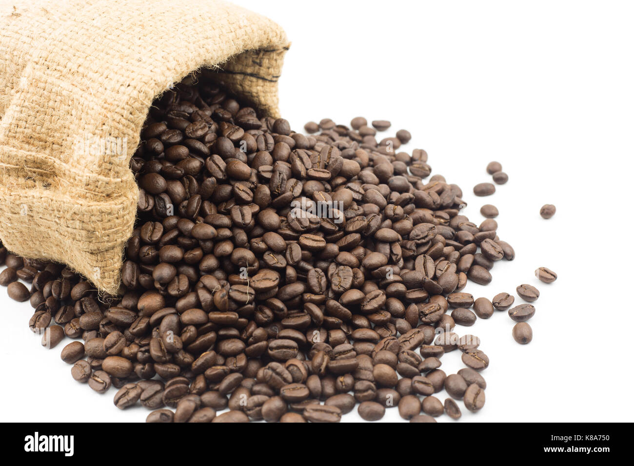 coffee beans in bag isolated on white background Stock Photo - Alamy