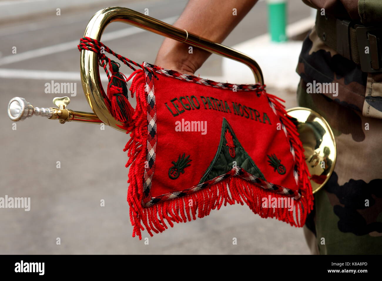 A bugler displays his instrument during the daily flag raising ceremony in Djibouti City on April 25, 2010. Stock Photo