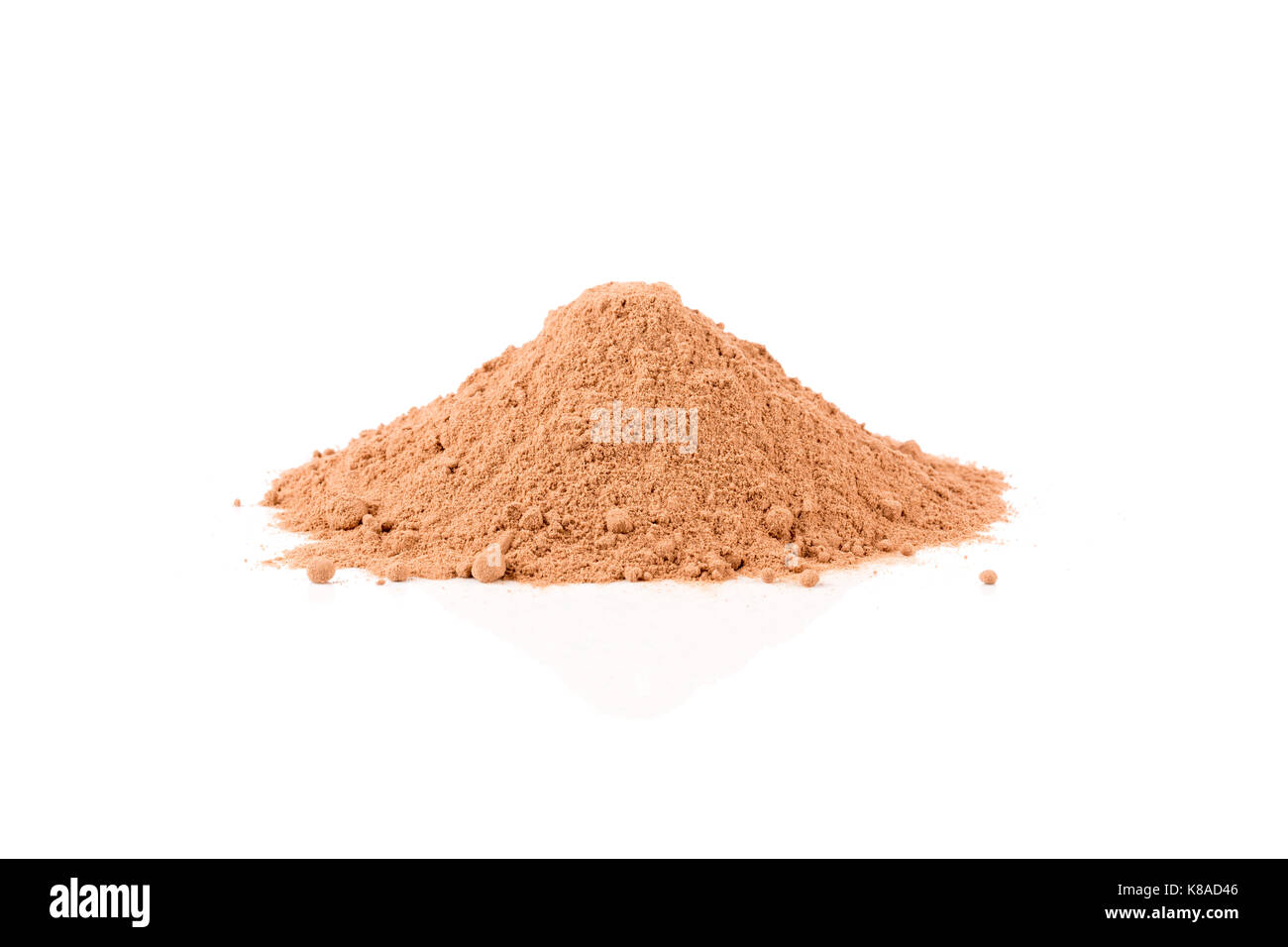 Heap of cocoa powder isolated on a white background Stock Photo - Alamy