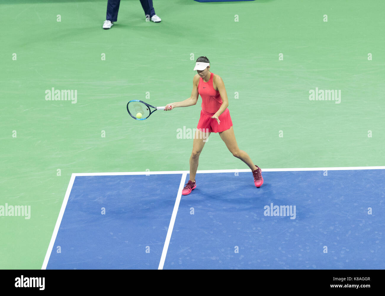 New York, NY USA - August 30, 2017: Oceane Dodin of France returns ball during match against Venus Williams of USA at US Open Championships at Billie Jean King National Tennis Center Stock Photo