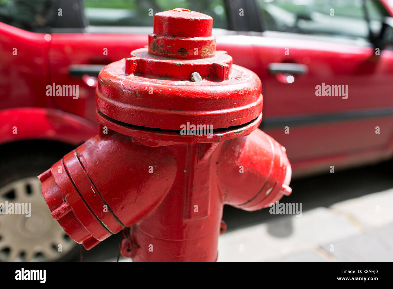 Red fire hydrant water pipe near the road. Fire hydrant for emergency