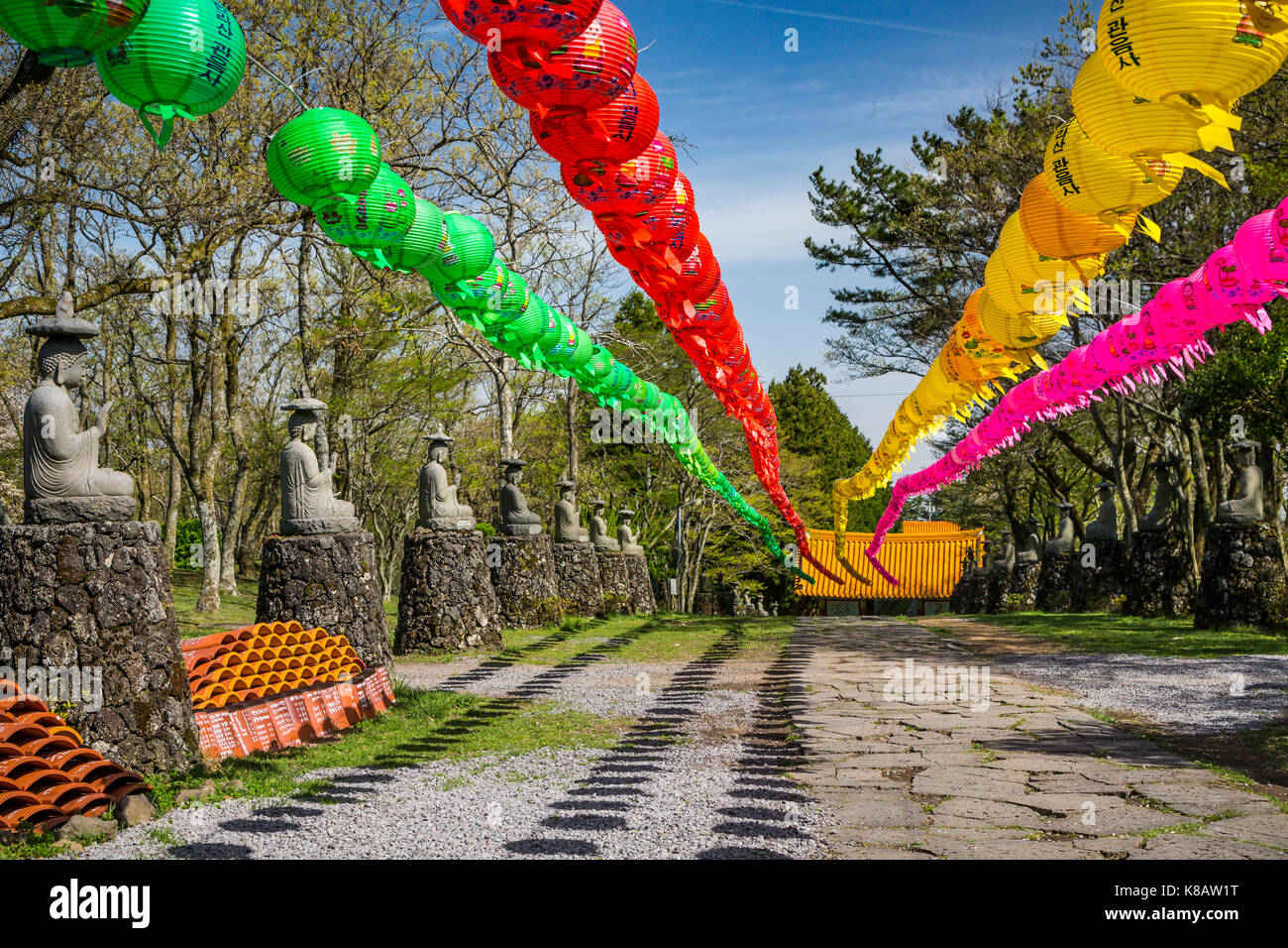 The entrance to the Gwaneumsa Temple with colorful lanerns at the foot of Mt. Halla in Ara-dong in Jeju City, Jeju Island, South Korea, Asia. Stock Photo