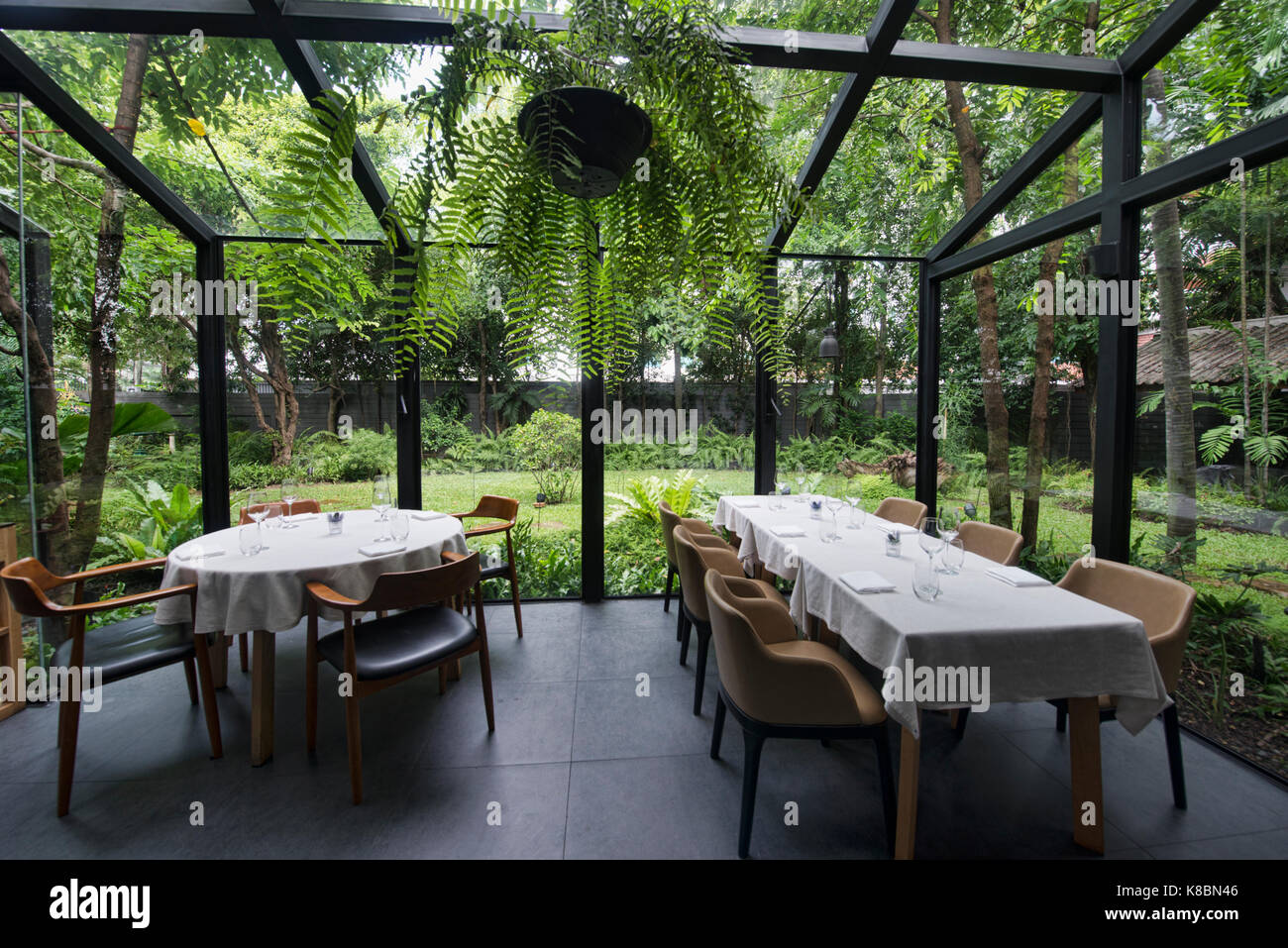 Glasshouse Garden At Suhring Restaurant, Bangkok, Thailand Stock Photo -  Alamy