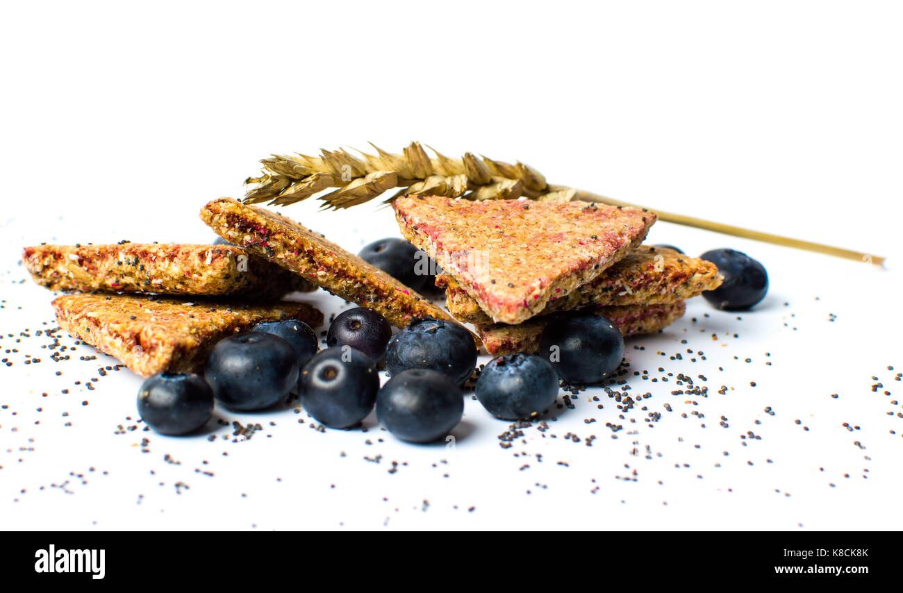 Triangle integral biscuits with blueberry fruit isolated Stock Photo
