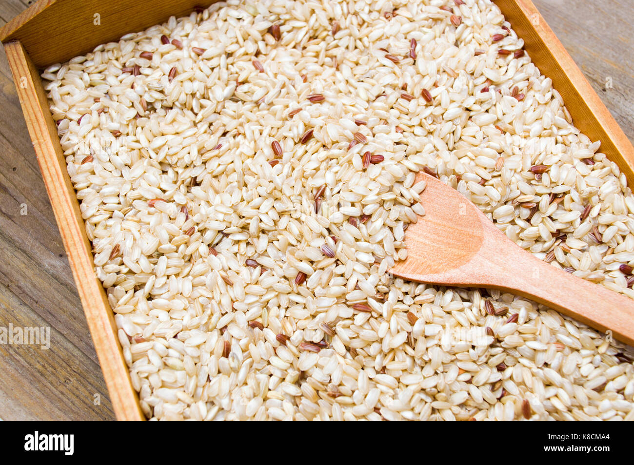 Rice yellow spoon hi-res stock photography and images - Alamy