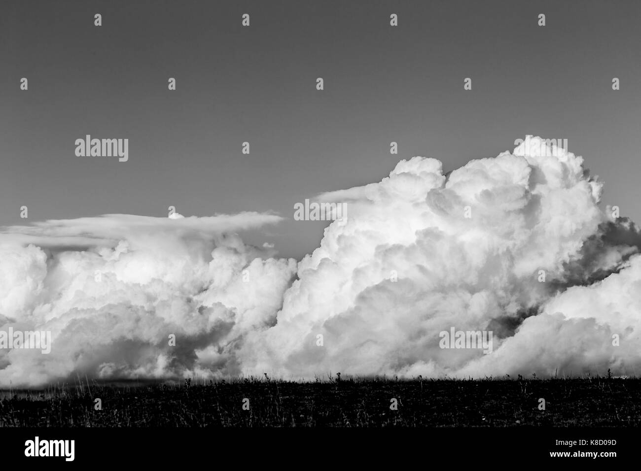 Big fluffy clouds and landscape hi-res stock photography and images - Alamy