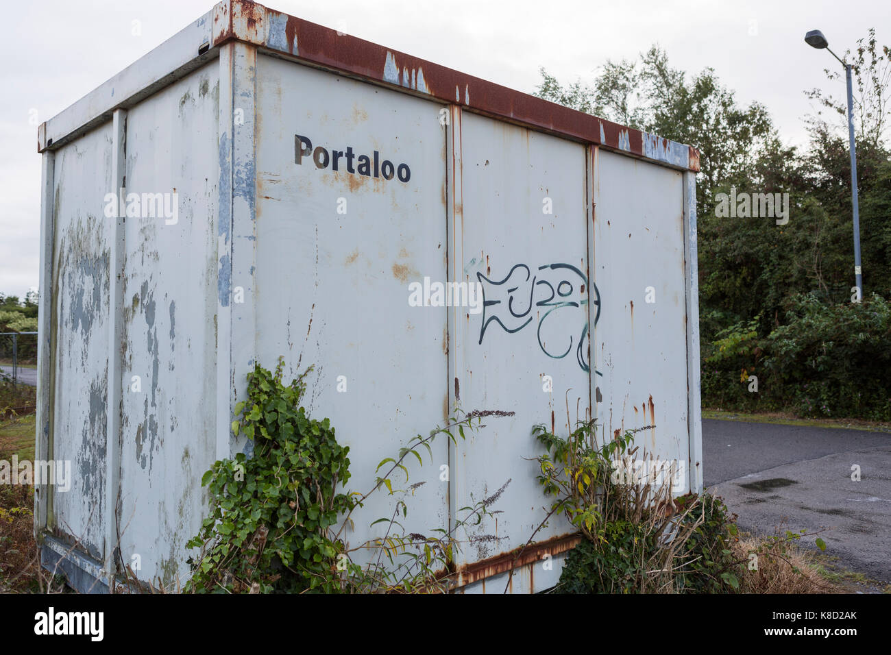 Oldmobile toilets in shipping container Stock Photo