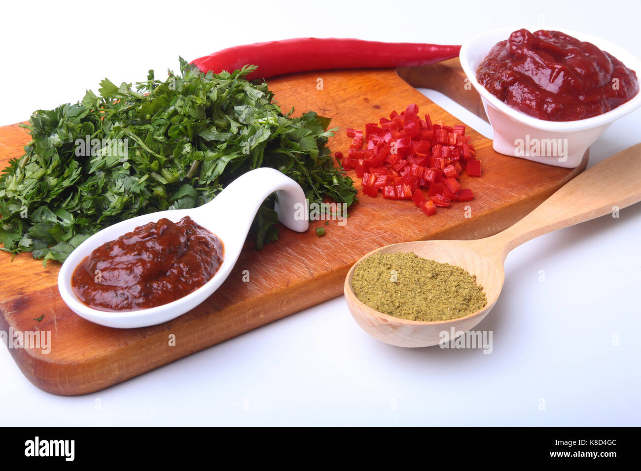 Fresh green cilantro, coriander leaves, tomato paste, chili pepper and