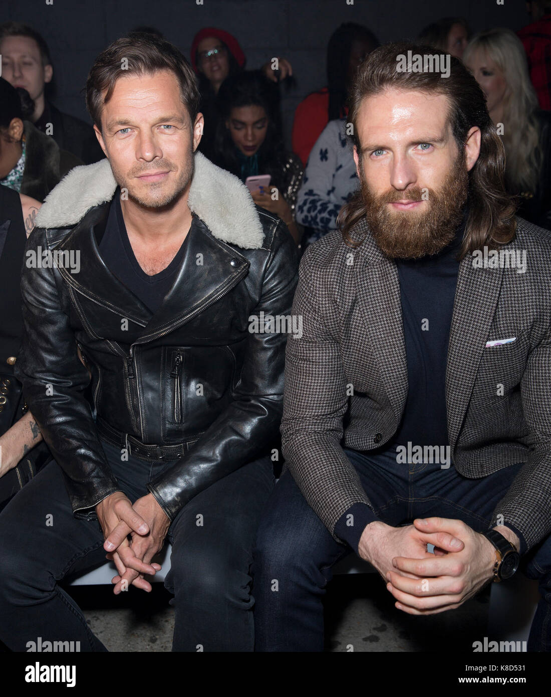 Paul Sculfor, left, and Craig McGinlay on the front row during the Julien Macdonald London Fashion Week SS18 show held at No 1 Invicta Plaza, London Stock Photo