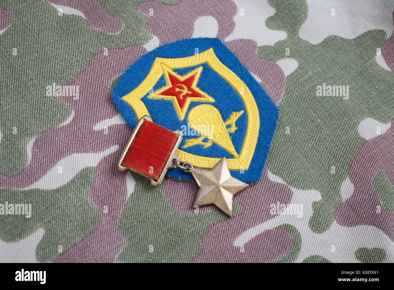 The Gold Star medal is a special insignia that identifies recipients of the title 'Hero' in the Soviet Union on Soviet and Airborne forces shoulder pa Stock Photo
