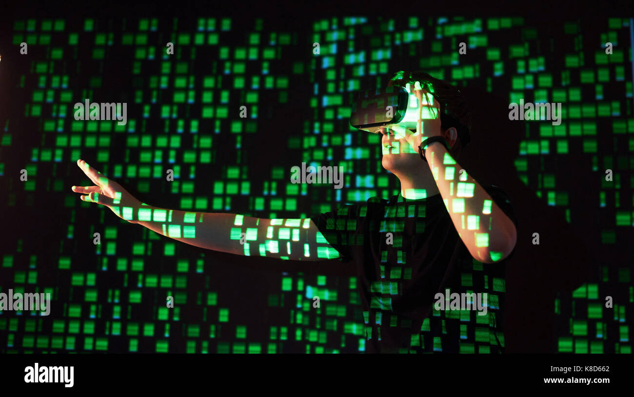 Double exposure of a caucasian man and Virtual reality headset is ...