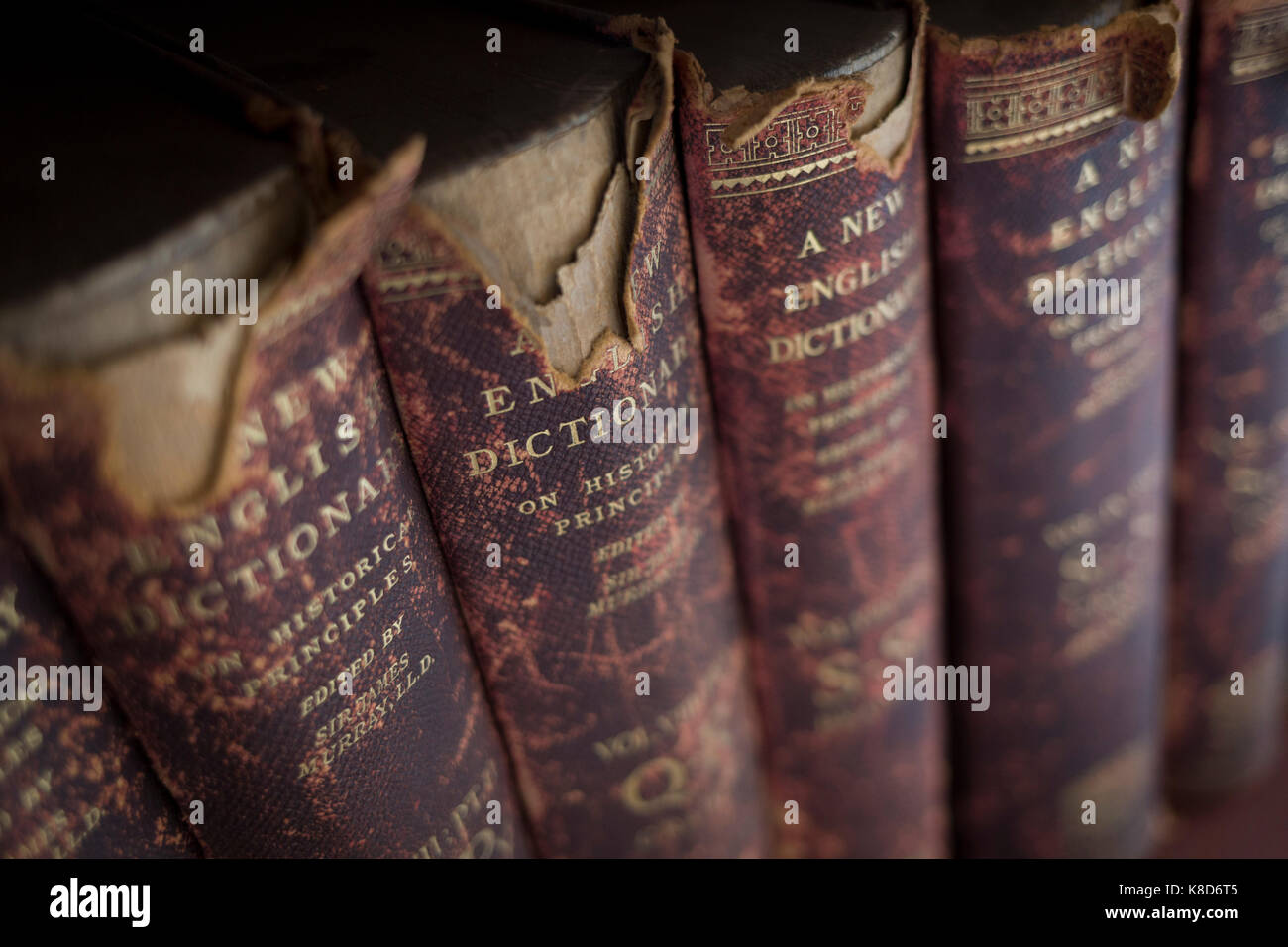 Antiquarian copies of The New English Dictionary on Historical Principles edited by Sir James Murray, line shelves in the Lee Library of the British Academy, on 17th September 2017, at 10-12 Carlton House Terrace, in London, England. Sir James Augustus Henry Murray (1837-1915) was a Scottish lexicographer and philologist. He was the primary editor of the Oxford English Dictionary (OED) from 1879 until his death. Stock Photo