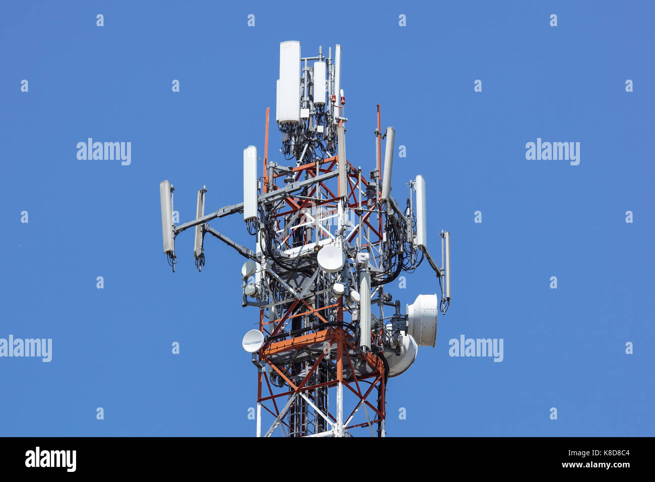 Antenna tower,antenna tower building with the blue sky.Close-up of the antenna building with the sky background. Stock Photo