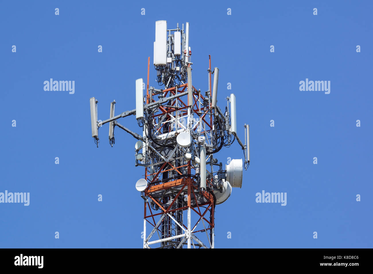 Antenna tower,antenna tower building with the blue sky.Close-up of the antenna building with the sky background. Stock Photo