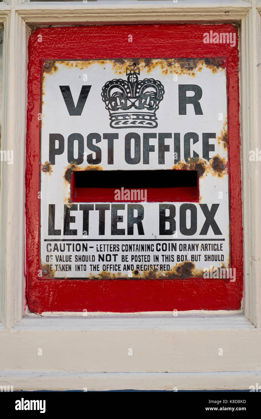 Victorian letter box. Post box with crown and VR initials. Stock Photo