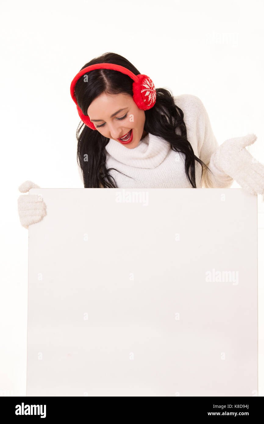 Attractive young woman holding white signboard Stock Photo