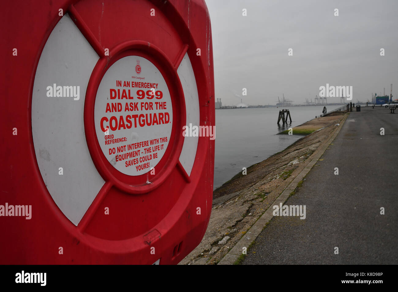 A coastguard station with lifebuoy for emergency next to the waterside