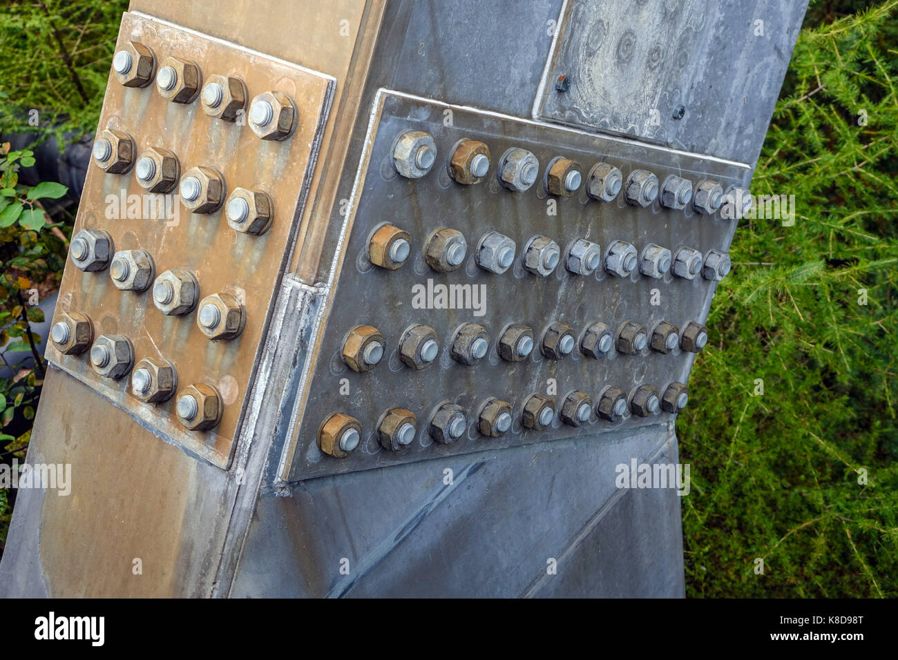 Nuts and bolts holding steel plate onto bridge support, Imst, Austria