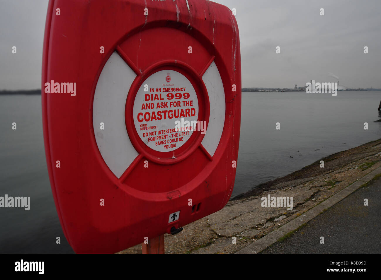 A coastguard station with lifebuoy  for emergency  next to the waterside at Southampton Estuary Mayflower park part of docks Stock Photo
