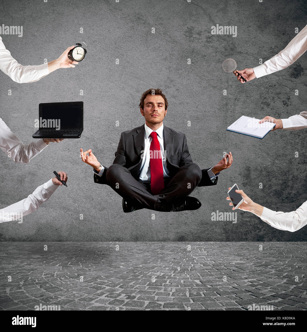 Relaxed businessman that does yoga during the work Stock Photo - Alamy