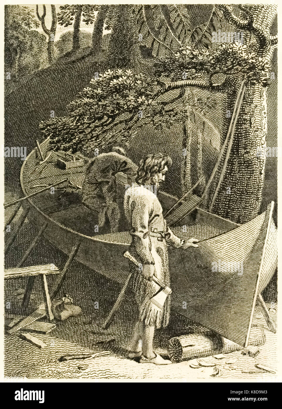 ‘Robinson Crusoe and Friday making a Boat’ from “The Life and Strange Surprising Adventures of Robinson Crusoe, or York, Mariner” by Daniel Defoe (1660-1731). Illustration by Thomas Stothard (1755-1834) engraving by Thomas Medland (1765-1833). See more information below Stock Photo