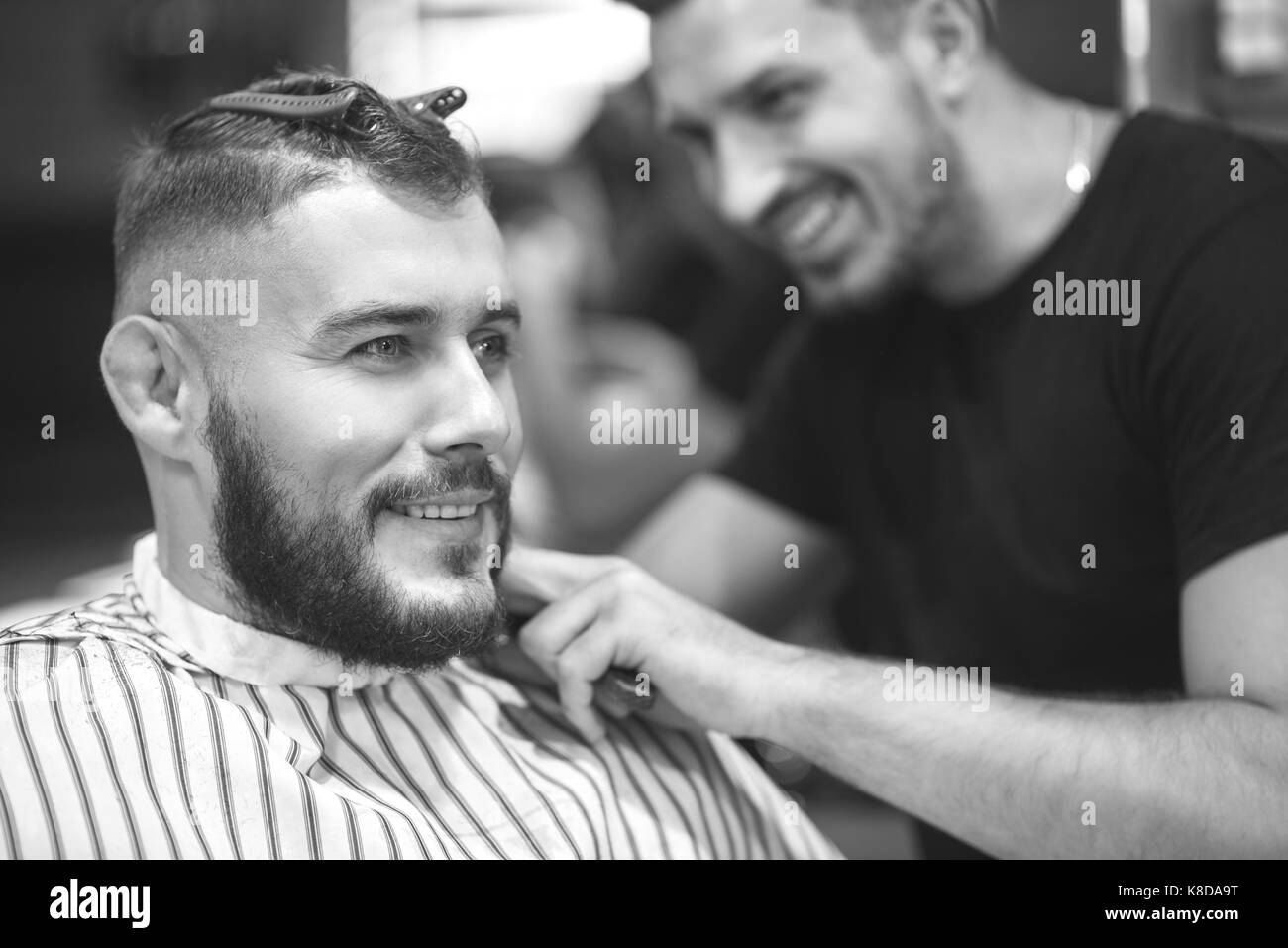 Young man at the barbershop Stock Photo