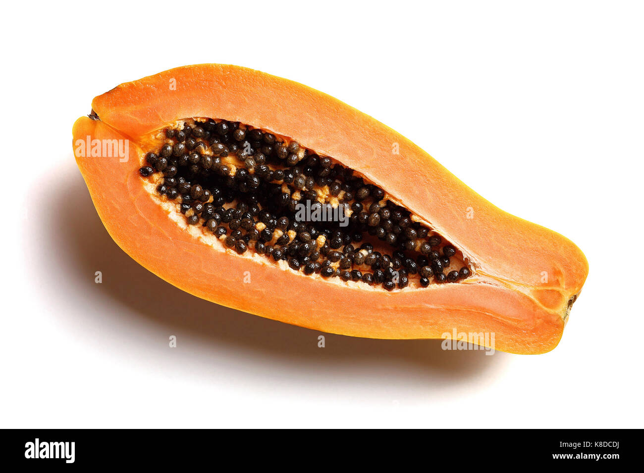 Papaya fruit (Paw Paw) cut in half on a plain white background from above Stock Photo