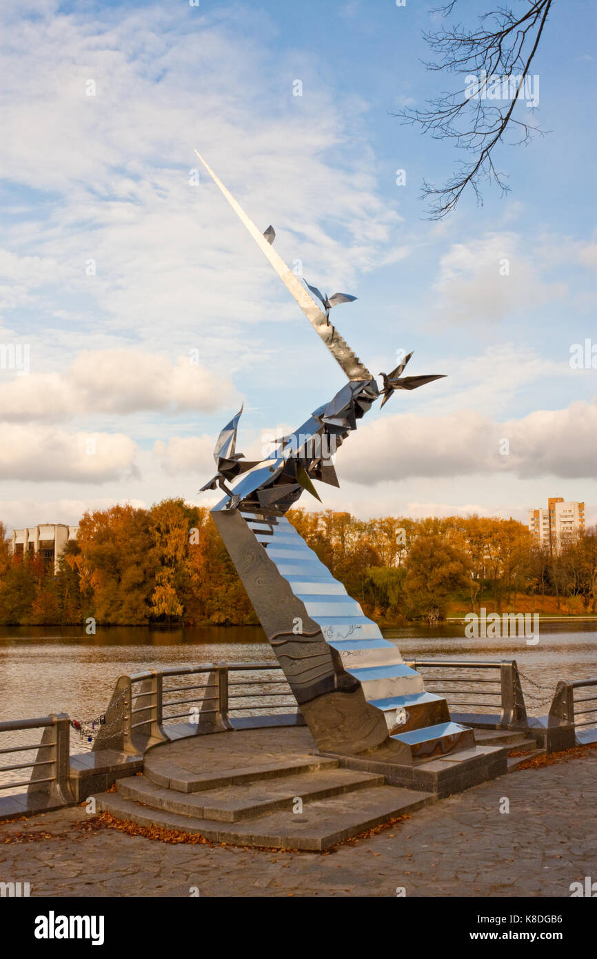 Minsk, Belarus - July 10, 2014: A sculpture 'Road to the future' by belarusian sculptor Pavel Voinitski on the lakeside in Victory park. Stock Photo