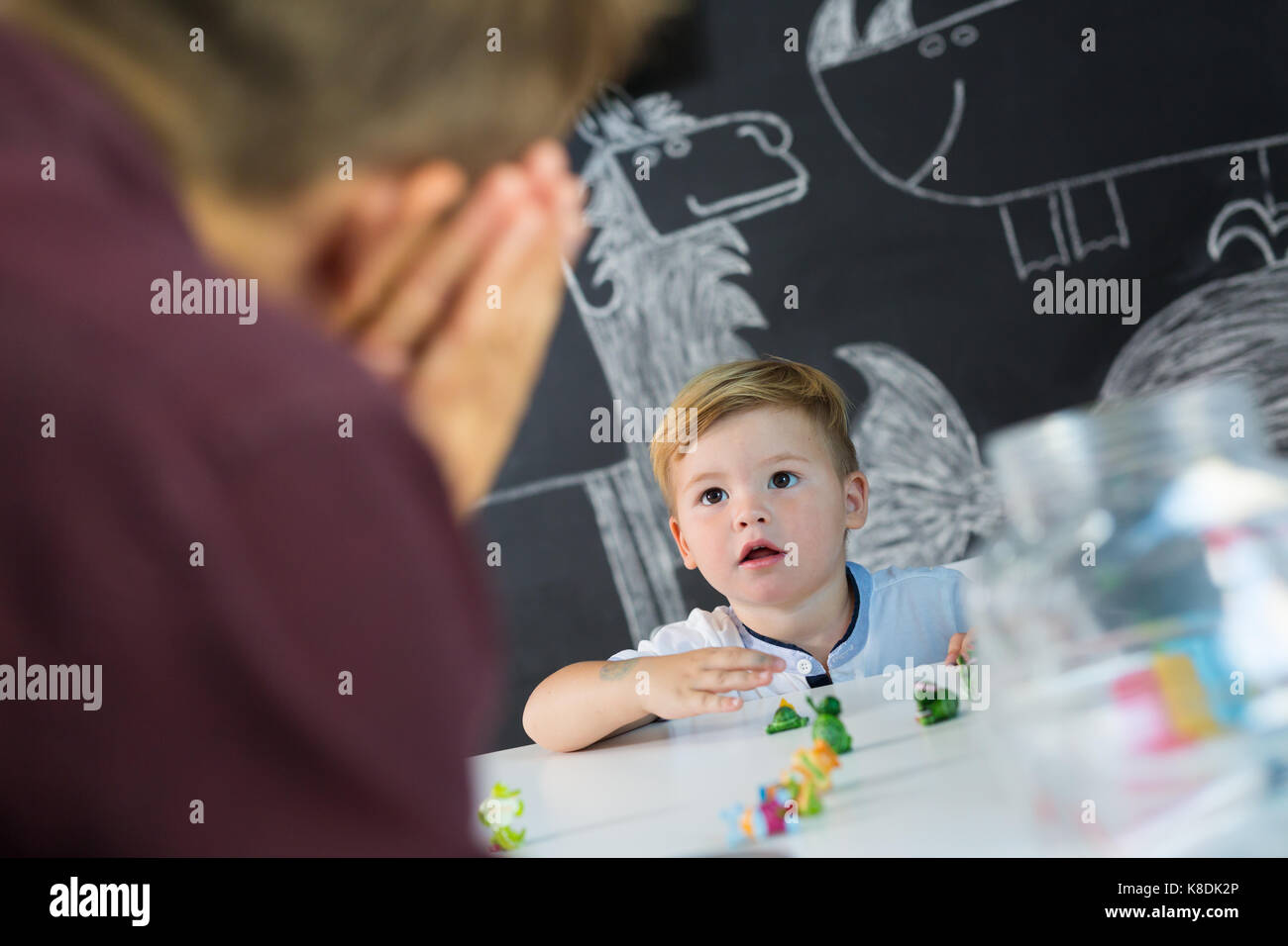 Cute little toddler boy at child therapy session. Stock Photo