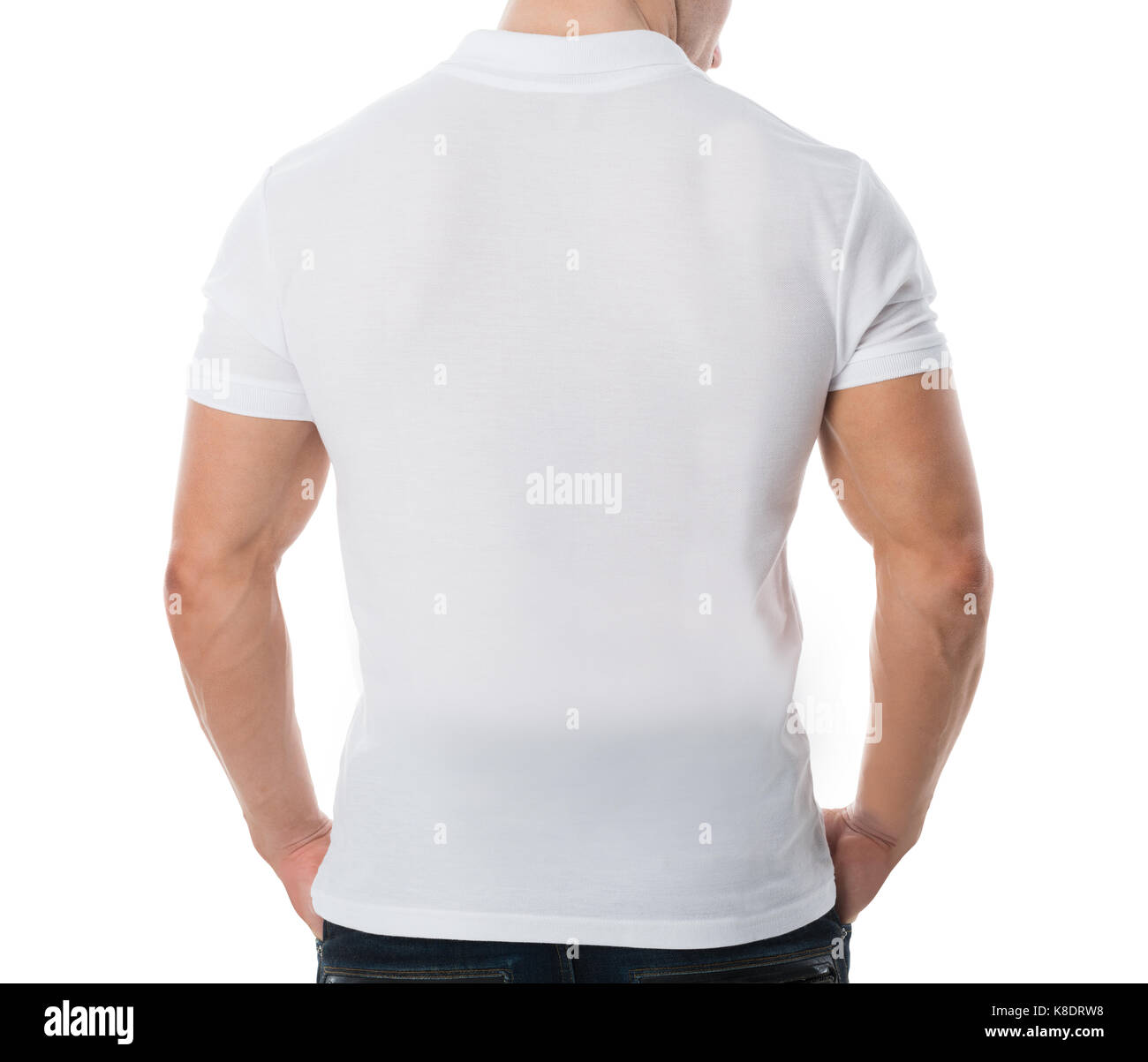 Midsection rear view of man wearing blank white tshirt standing against white background Stock Photo