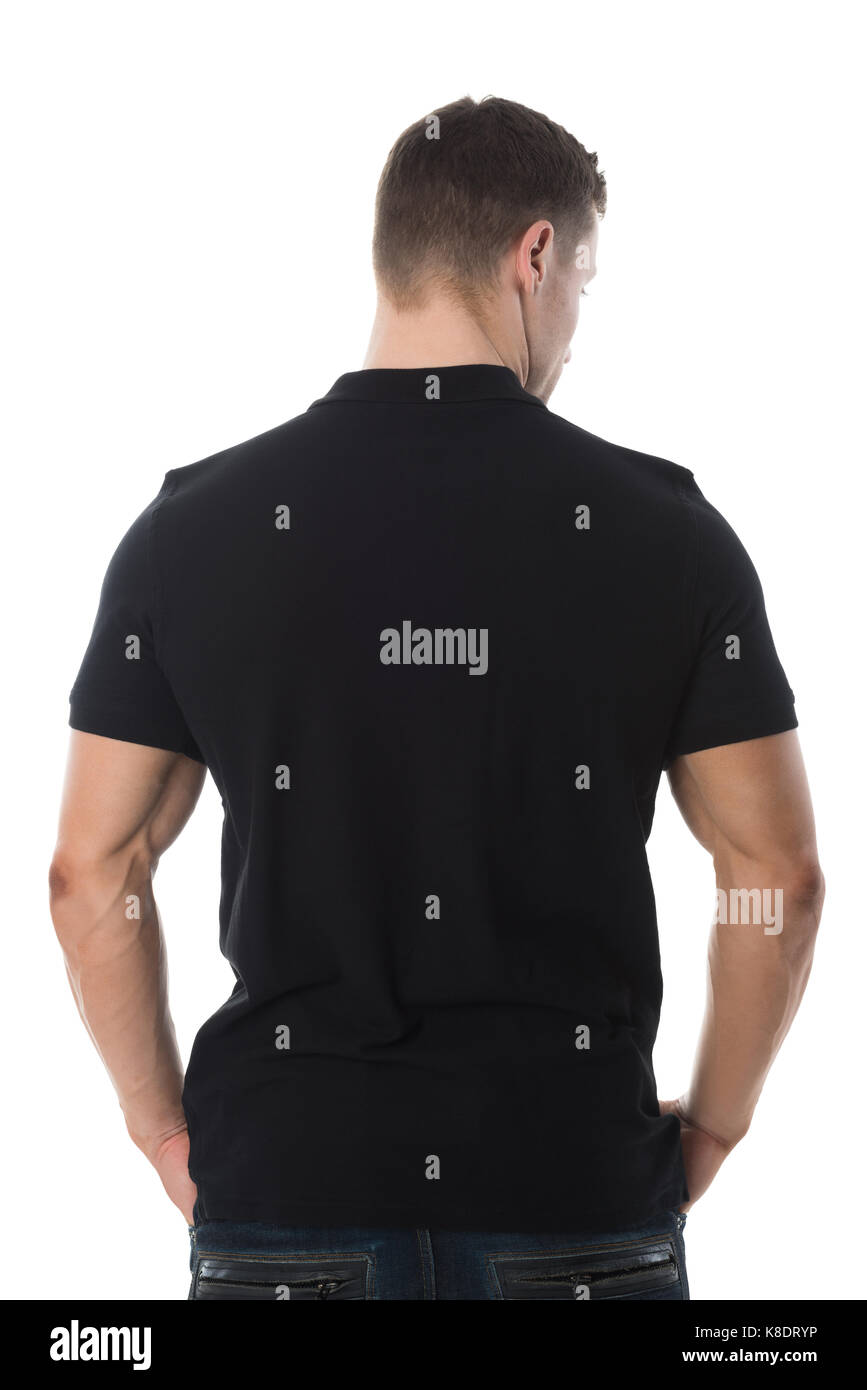 Rear view of man wearing blank black tshirt standing against white background Stock Photo
