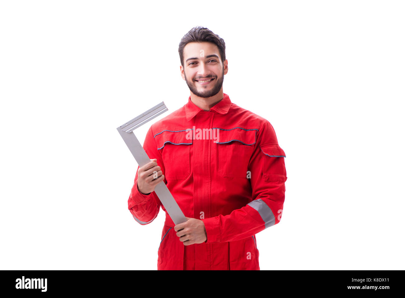 Young repairman with a square ruler isolated on white background Stock ...