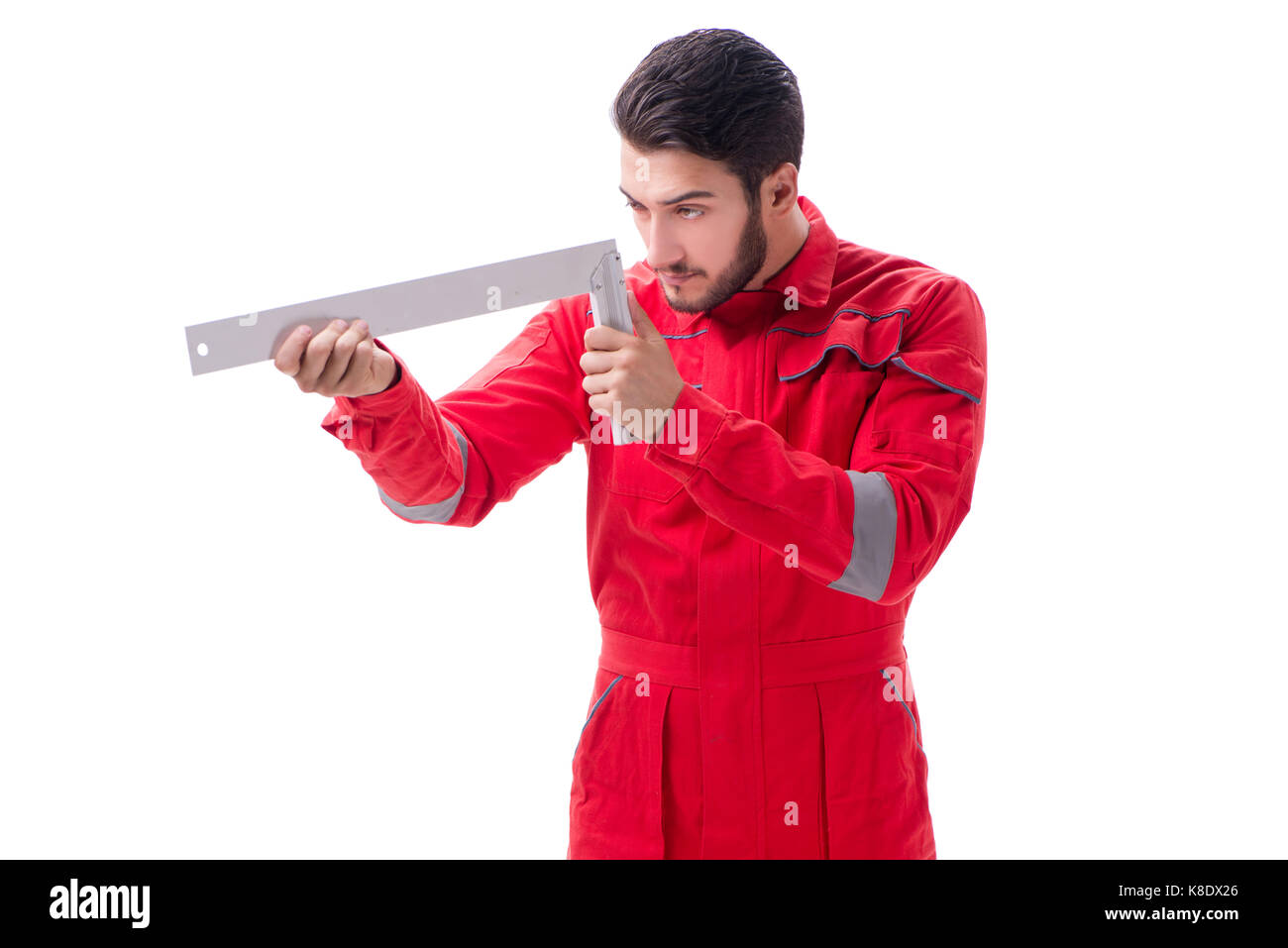 Young repairman with a square ruler isolated on white background Stock ...