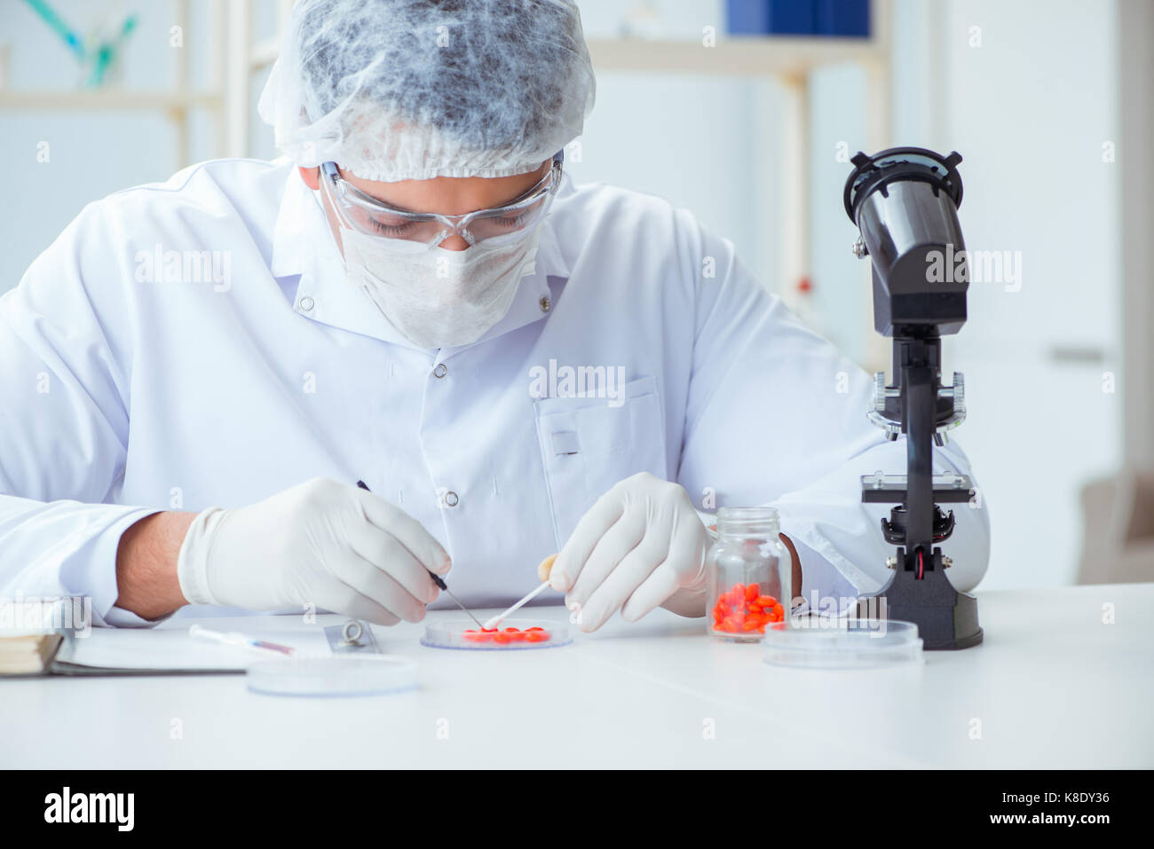 Doctor testing new drugs for medical purposes Stock Photo Alamy