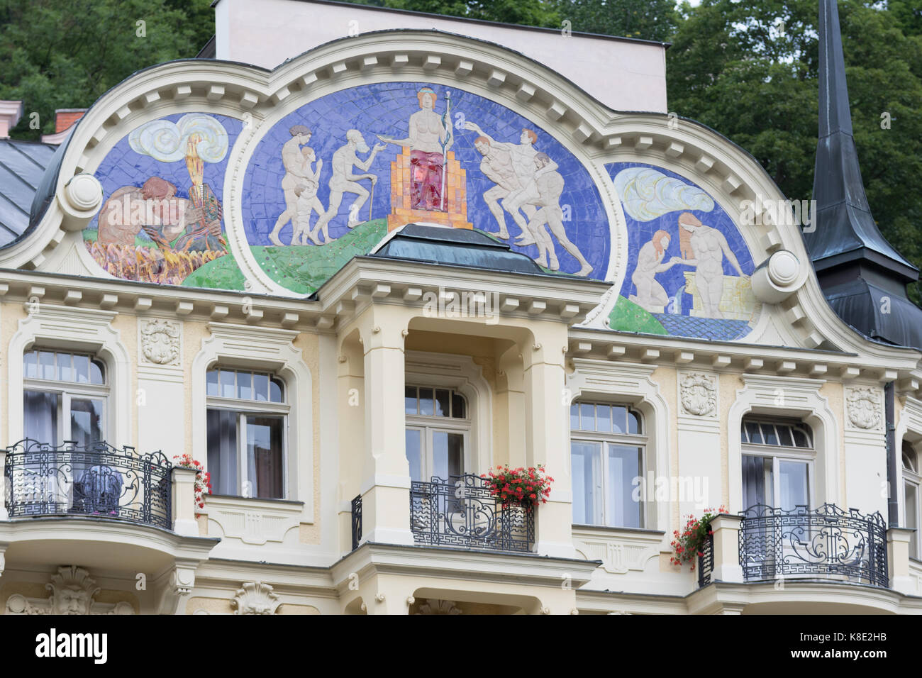Karlovy Vary, Czech Republic - August 15, 2017:Detail of a condominium with two windows overlaid by a colorful mosaic Stock Photo