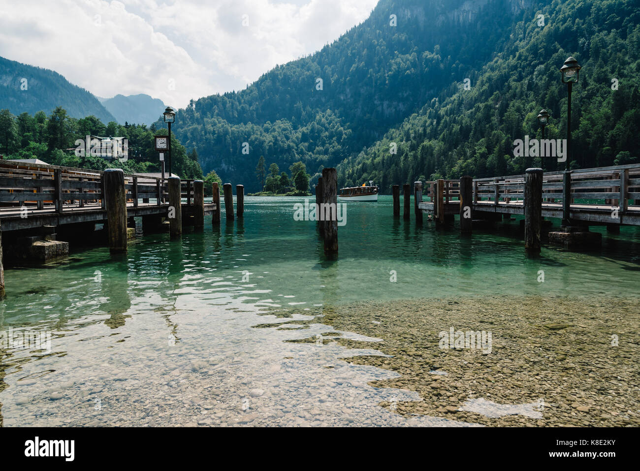 Pier in Konigssee lake a sunny summer day Stock Photo