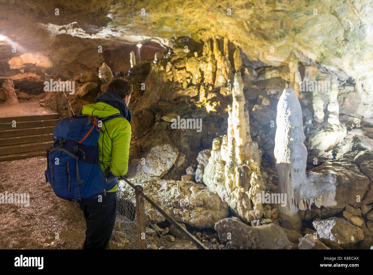 Tourist in Nebula Cave, stalagmites and stalactites, Sonnenbühl, Baden-Württemberg, Germany Stock Photo